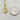 Non-tarnish, waterproof stainless steel and 18kt gold plated little cross with clear cz stones on a textured surface. Cross style necklace. Crosses represent a symbol of one's devotion to God, hope, protection, and as a fashion statement. Great to wear alone or layered with complimenting necklaces.