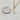 Mini Italian horn pendant necklace. 18kt gold plated stainless steel, non-tarnish and waterproof. Classic, edgy, and stylish. Can be worn from day to evening. Great for layering with other necklaces. 