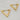 Non-tarnish, waterproof 18kt gold plated triangle shaped huggie style earrings. Unique style and shape earrings. They can be worn with any outfit and can complement almost any necklace style.