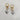 18kt gold plated, stainless steel, two tone, heart earrings with a little clear cz stone. Chunky trending style that's very unique, elegant, and elevated. Great to wear from day to evening. 