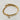 18kt gold stainless steel, non-tarnish, half bangle half link chain and a clear cz charm. Unique design and statement piece.