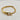 18kt gold stainless steel, non-tarnish, half bangle half link chain and a clear cz charm. Unique design and statement piece.