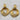Bold gold statement earrings featuring a sculptural ribbed design and geometric open drop. A luxe, vintage-inspired earring for standout style.