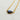 Large triangular shaped labradorite gemstone on a gold chain. 