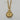 A gold-tone pendant necklace featuring a circular medallion with an angel and heart design, accented with small clear stones, hanging from a gold chain.