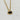 A gold chain necklace with a small oval pendant featuring a dark brown tiger's eye stone.
