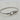 Silver twisted cable bracelet with buckle-inspired clasp and sparkling crystal accents.