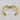 Gold-tone double layer cuff bracelet with a polished finish and sculptural curved V design.
