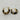 A pair of small gold hoop earrings with a glossy black curved inlay design