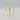 A pair of gold hoop earrings with a textured, diamond-like paved edge.