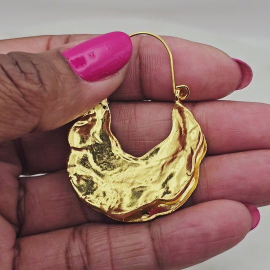 18kt gold plated chunky statement earrings. The unique shape and shiny texture add flair to any outfit, elevating your style. 