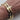 Non-tarnish, waterproof stainless steel and 18kt gold plated clear crystals bangle style. Great for layering with other bangles, permanent jewelry bracelets or worn alone. Elegant design.