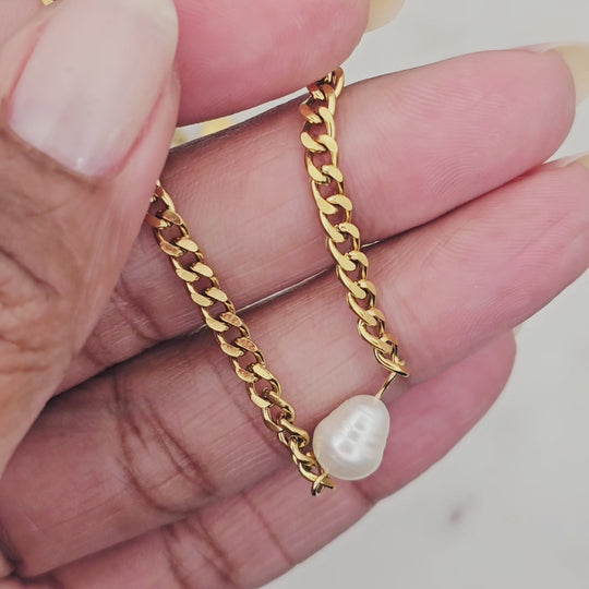 18kt gold plating over stainless steel, non-tarnish and waterproof. Pearl choker design necklace made on a chunky chain. Very unique, elegant, and stylish. Can be worn from day to evening, and on special occasions. Great for layering with other necklaces.