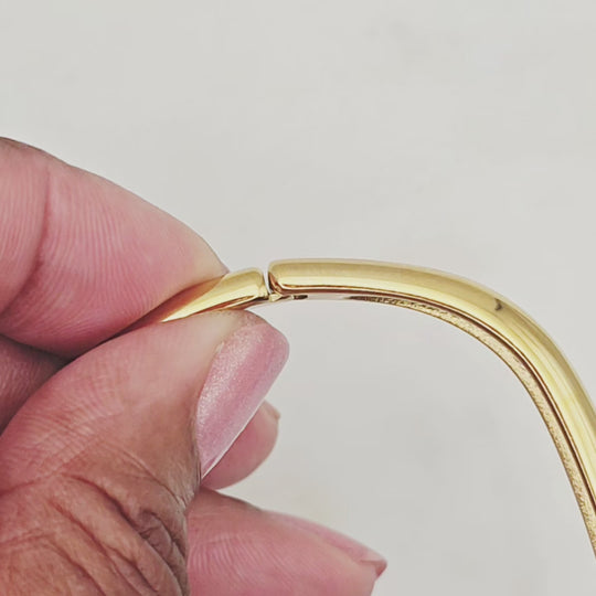 Non-tarnish, waterproof stainless steel and 18kt gold plated cuff bangle style. Unique square shape. Great for layering with other bangles, permanent jewelry bracelets or worn alone. Elegant and unique design.