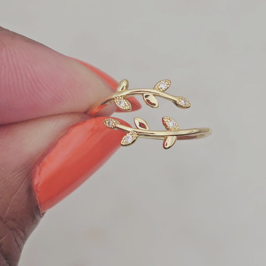 14kt gold filled adjustable ring. Dainty and delicate leaf design with tiny clear crystals for an extra unique touch and flair. This ring is great to layer with other complimenting rings and jewelry.