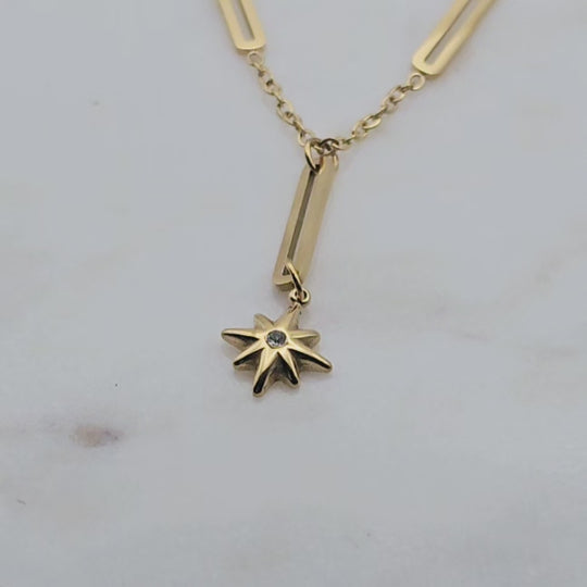 18kt gold plating over stainless steel. Fancy link chain with starburst pendant. Trending style. Great for layering with other necklaces. 