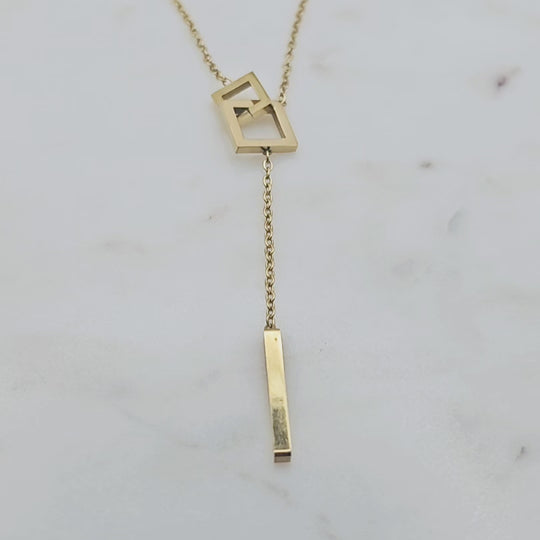 18kt gold plated stainless steel dainty necklace. Square geometric shapes and oblong pendant. Great for layering necklaces.