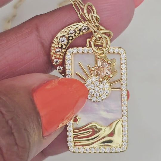 14kt gold filled sun, star and moon multi charm pendant necklace. Tarot style. Crescent moons symbolize new beginnings, hope, and the potential for growth. This necklace is great to wear alone or with other complimenting necklaces.