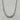 A silver-toned metal necklace with a geometric link design, featuring elongated cylindrical links connected by smaller intersecting bars.