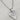 Gold stainless steel, non-tarnish necklace. Unique shaped heart pendant with texture details on a tiny hearts chain.  Great to wear alone or layering with other necklaces.  Great gift for heart jewelry lovers. 