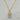 18kt gold plated, Stainless steel, non-tarnish necklace. The design is vintage inspired made with a cream and beige colored lucite material encased with stainless steel metal.