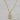 18kt gold plated, Stainless steel, non-tarnish necklace. The design is vintage inspired made with a cream and beige colored lucite material encased with stainless steel metal.